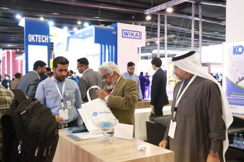 Zentech team distributing promotional material at SABIC 2025